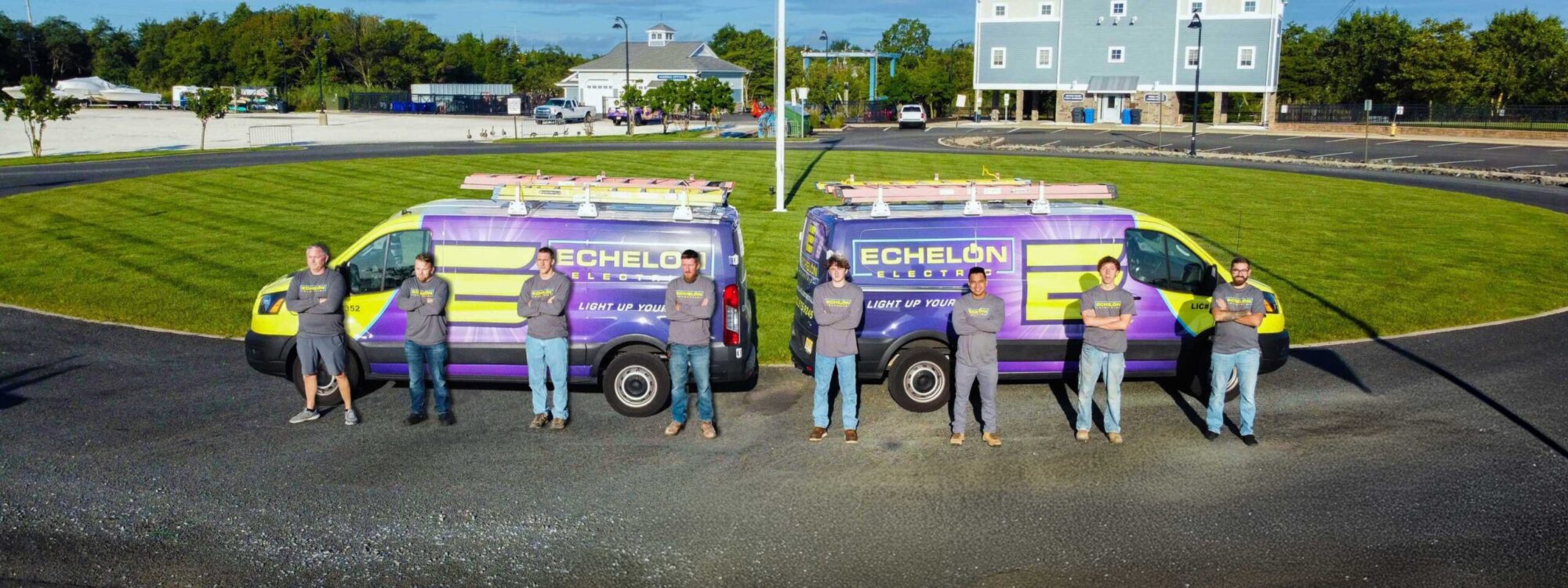 The Echelon Services team with their branded service vans